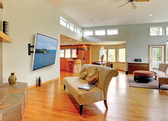 Peerless-AV PA746 Paramount Articulating Wall Mount for 32in to 50in Displays shown in use